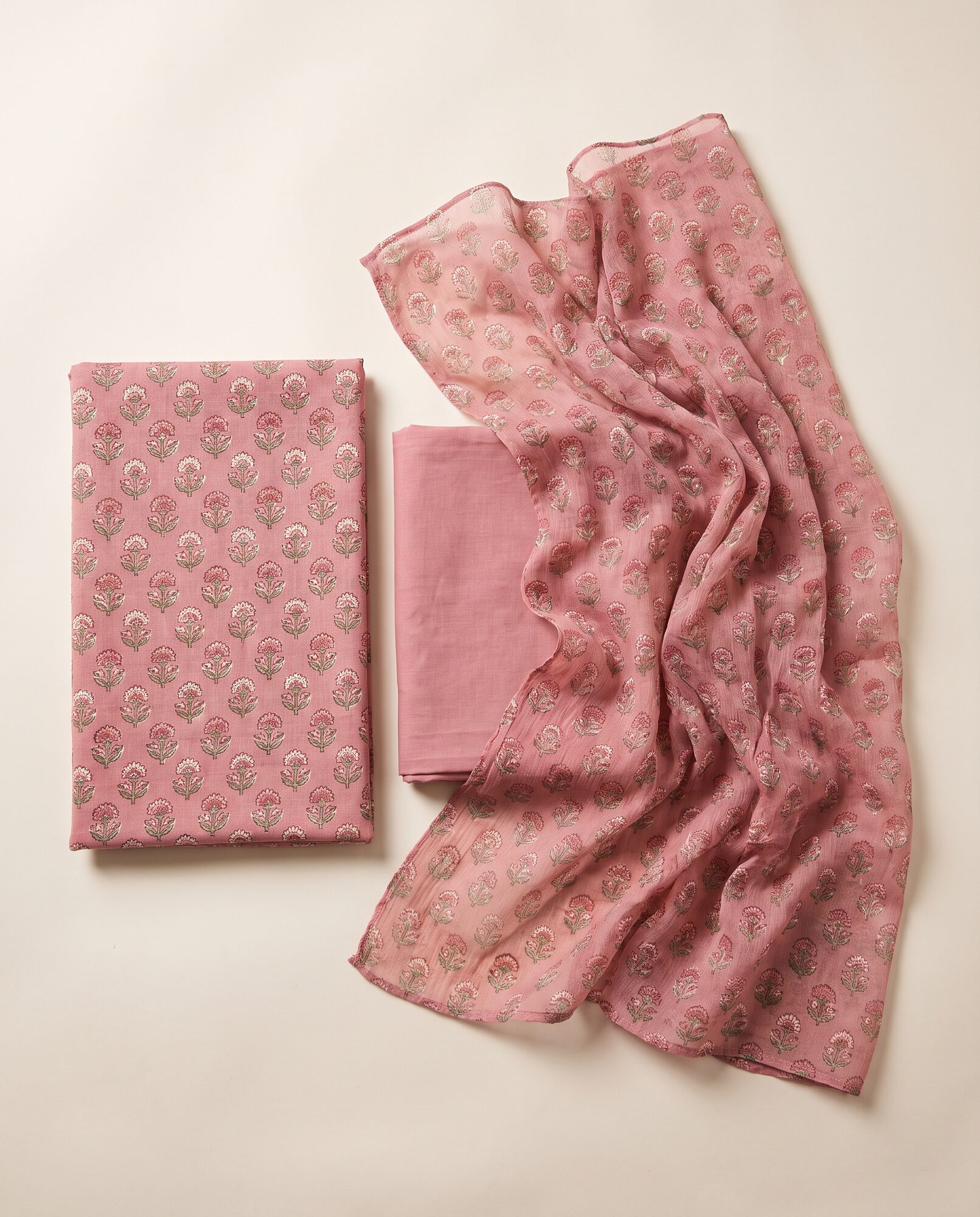 Printed Lawn Suit in dusty rose — unstitched three-piece laid flat